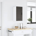 Pour un interieur harmonieux, armoire avec portes, a l'aspect bois en finition noir et bois naturel
