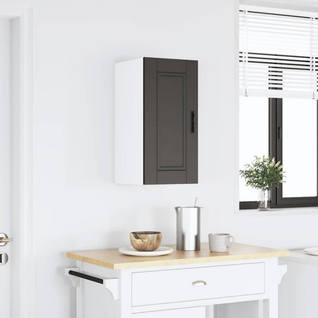 Pour un interieur harmonieux, armoire avec portes, a l'aspect bois en finition noir et bois naturel
